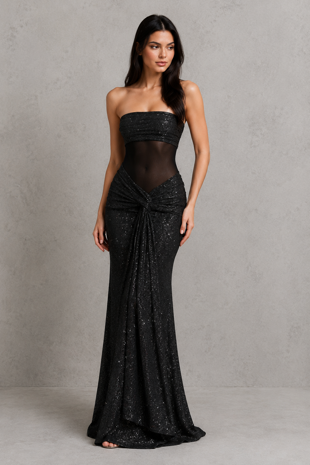 Women's strapless glitter maxi dress with ruched waist detail, fitted bodice, semi-sheer mesh bodice panel, fit-and-flare skirt, and shimmering finish for evening parties, formal events, and special occasions.