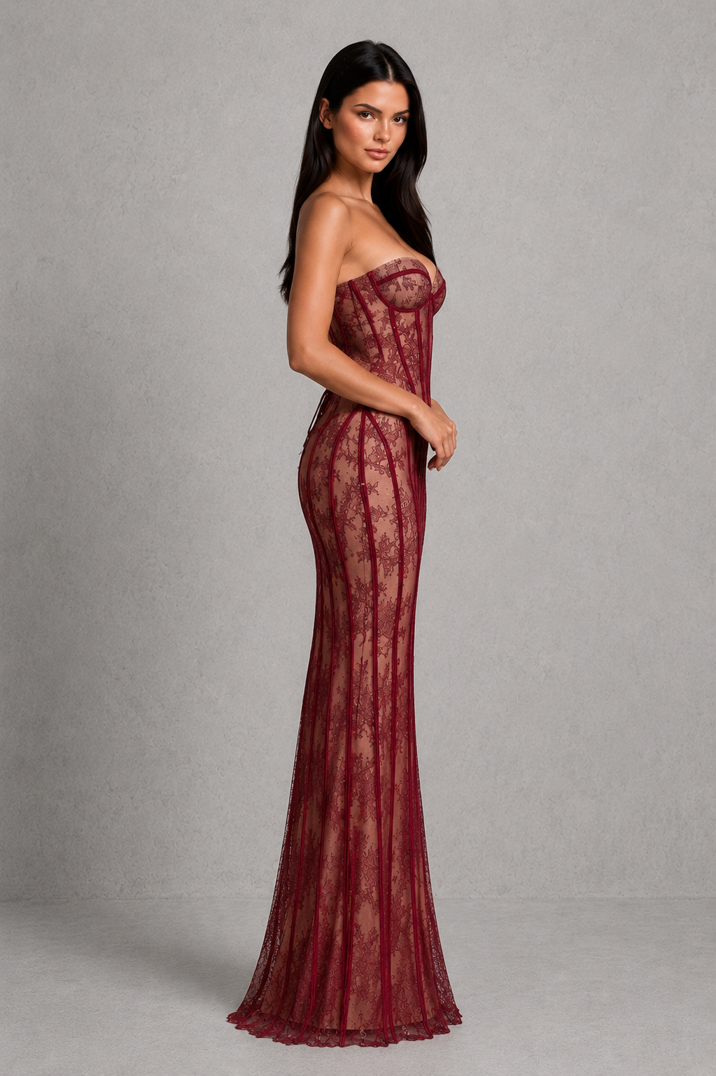 Women's strapless burgundy floral lace maxi dress with structured corset bodice, lightly padded underwired cups, lace-up back, column skirt, and elegant eyelash lace trim for formal occasions.