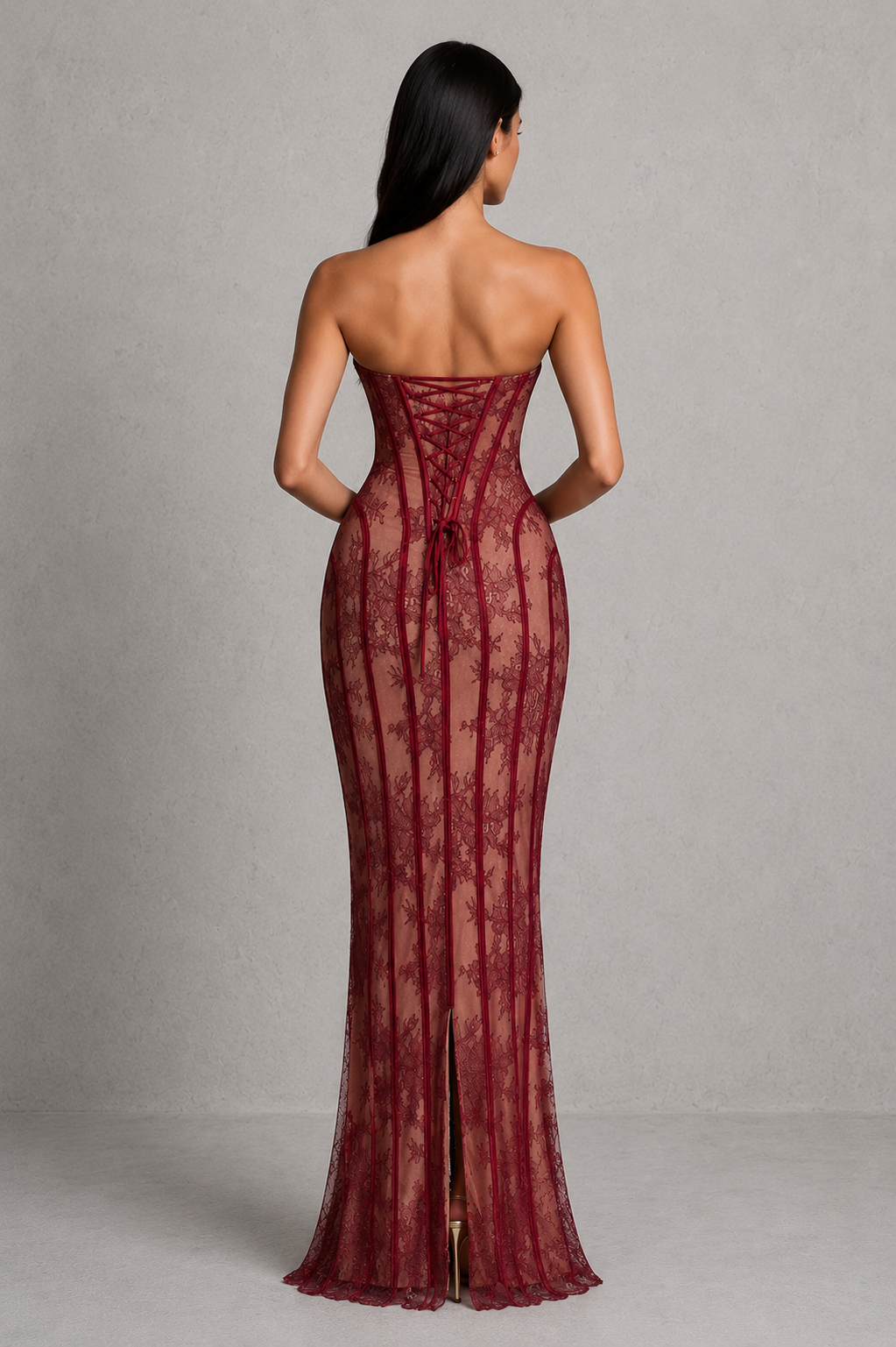 Women's strapless burgundy floral lace maxi dress with structured corset bodice, lightly padded underwired cups, lace-up back, column skirt, and elegant eyelash lace trim for formal occasions.