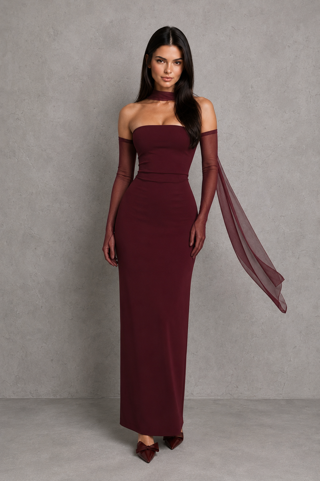 Women’s strapless maxi evening dress in premium crepe fabric featuring a pleated bodice, fitted column skirt, centre back split, and removable mesh halter strap with matching mesh scarf for versatile formal styling.