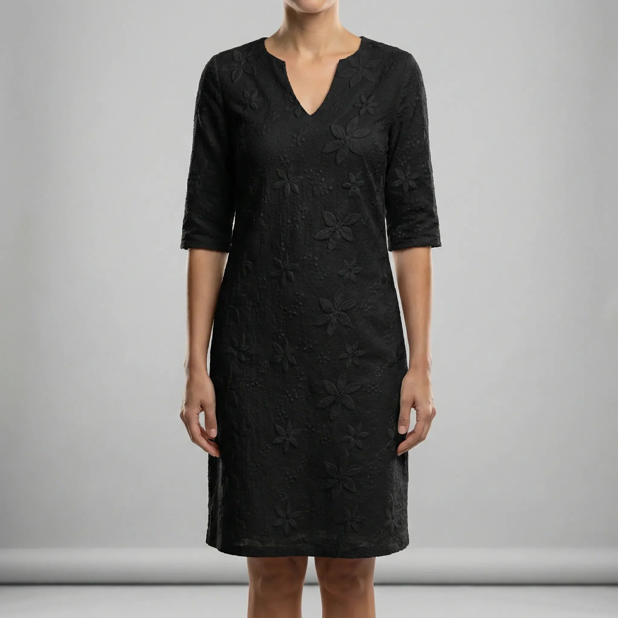 Women’s summer dress with V-neck, relaxed fit, and soft flowing drape