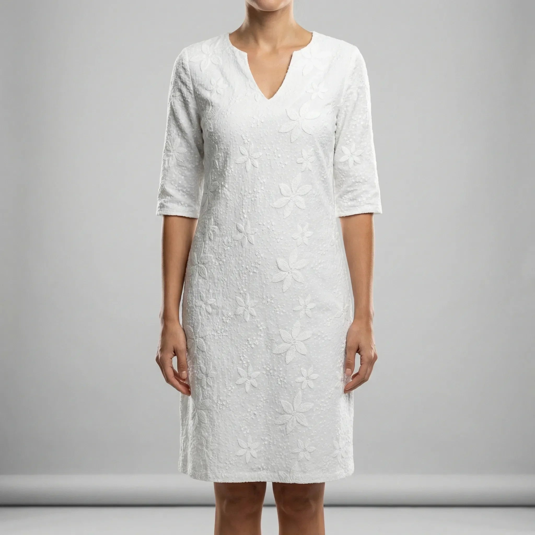 Women’s summer dress with V-neck, relaxed fit, and soft flowing drape