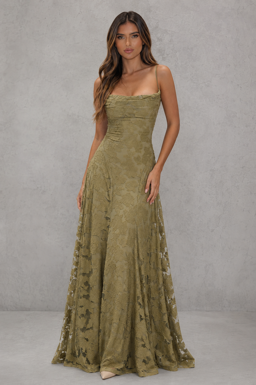 Women’s textured floral maxi dress with delicate shoulder straps, sculpted fitted bodice, defined waist, and flowing full-length skirt.