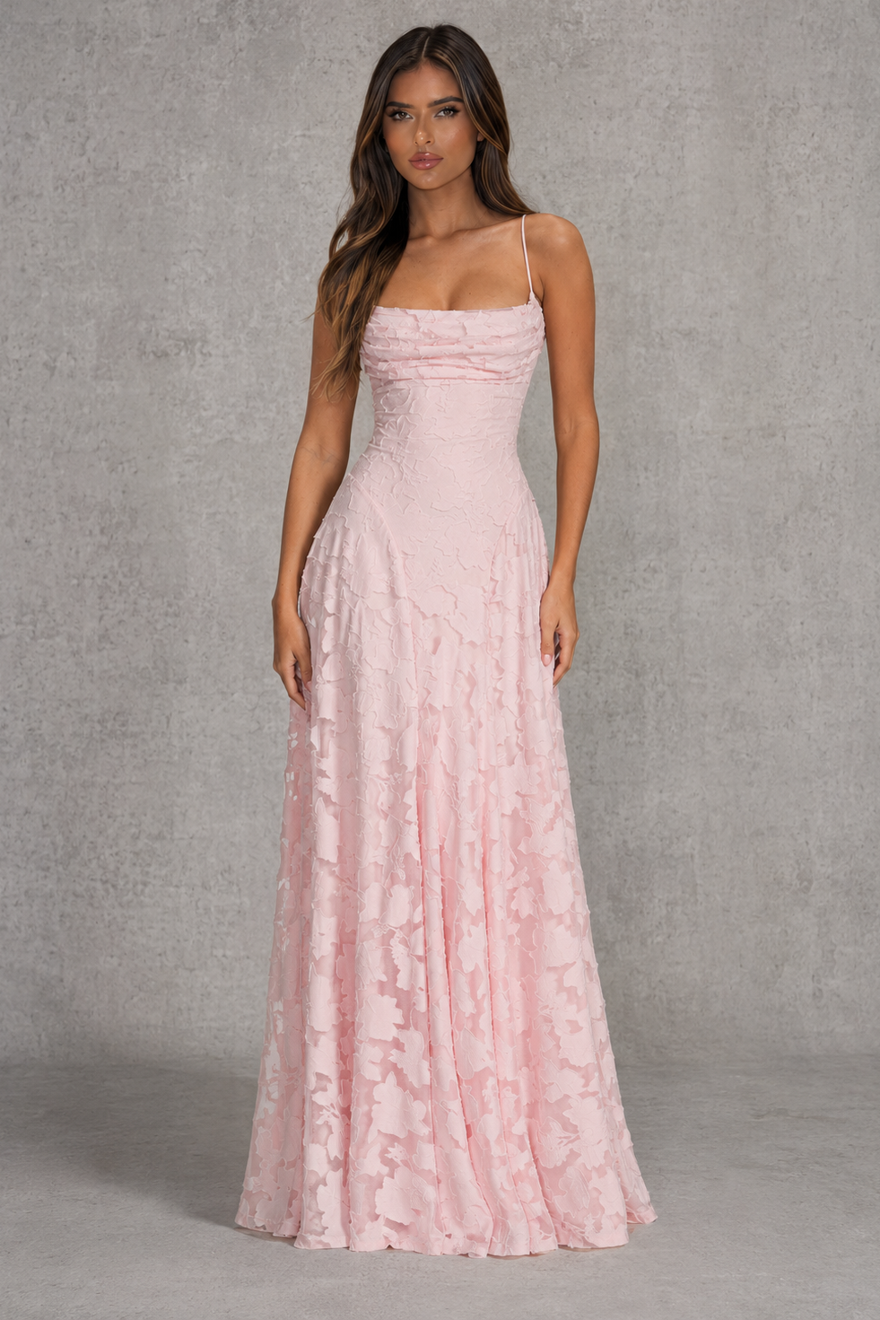 Women’s textured floral maxi dress with delicate shoulder straps, sculpted fitted bodice, defined waist, and flowing full-length skirt.