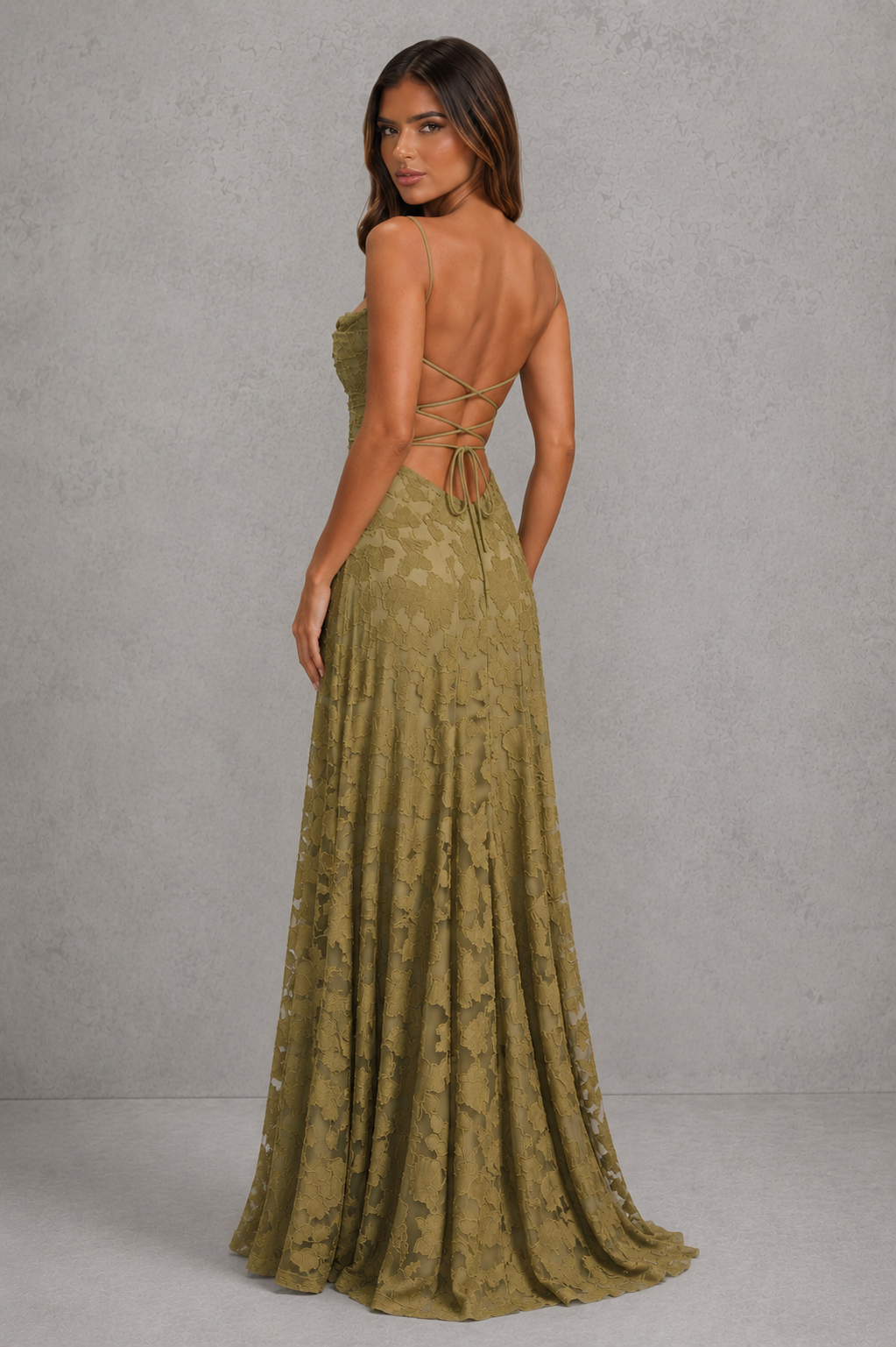 Women’s textured floral maxi dress with delicate shoulder straps, sculpted fitted bodice, defined waist, and flowing full-length skirt.