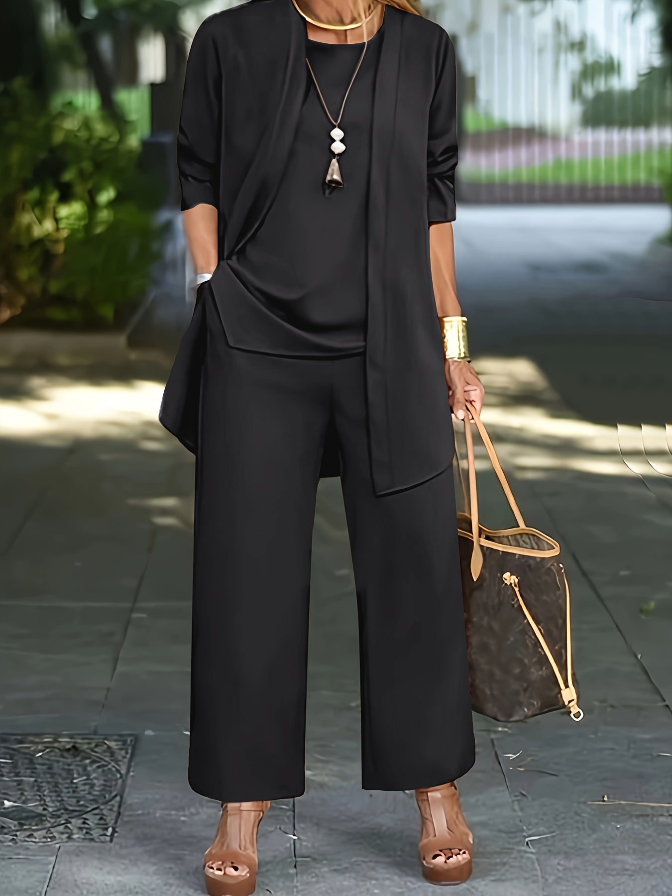 Women’s three-piece outfit set with vest, fitted top, and pants