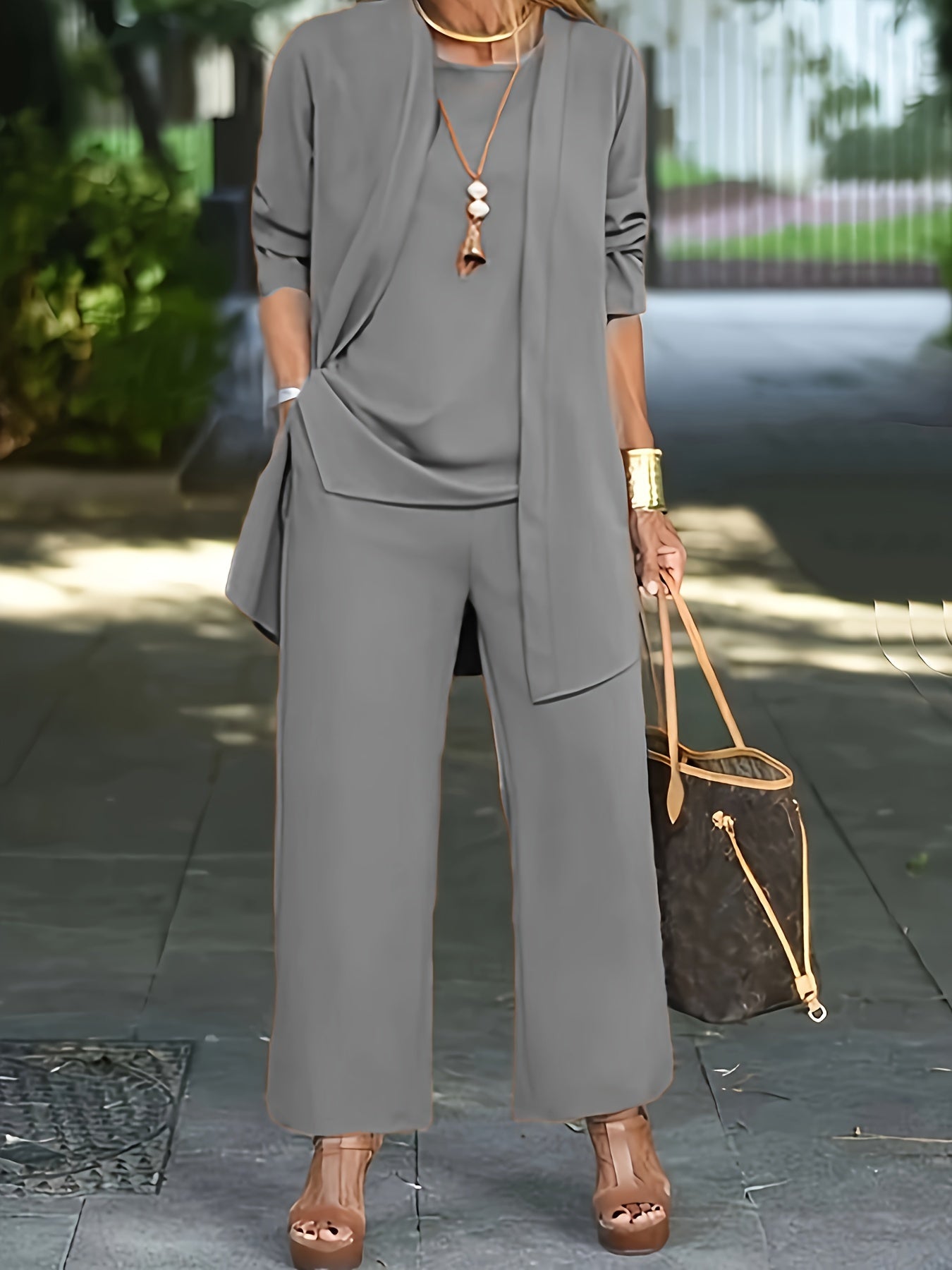 Women’s three-piece outfit set with vest, fitted top, and pants