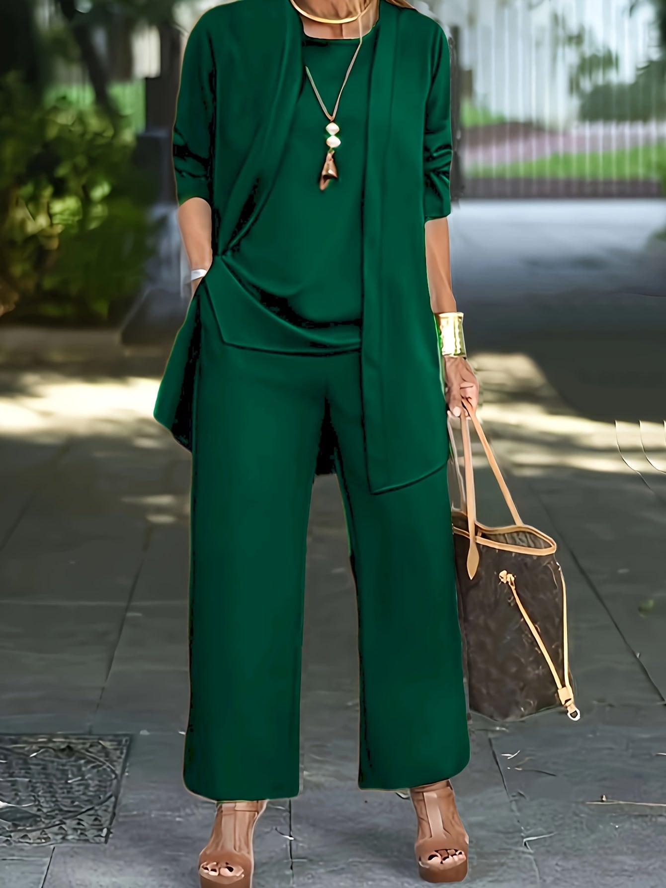Women’s three-piece outfit set with vest, fitted top, and pants