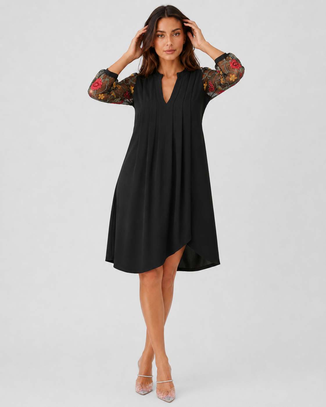 Women's floral mini dress with a V-neckline, sheer long sleeves, lightweight fabric, and a relaxed fit, ideal for casual wear, events, and evening outings.