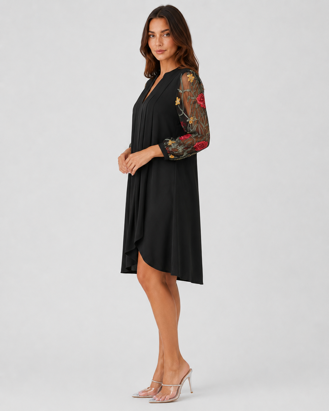 Women's floral mini dress with a V-neckline, sheer long sleeves, lightweight fabric, and a relaxed fit, ideal for casual wear, events, and evening outings.