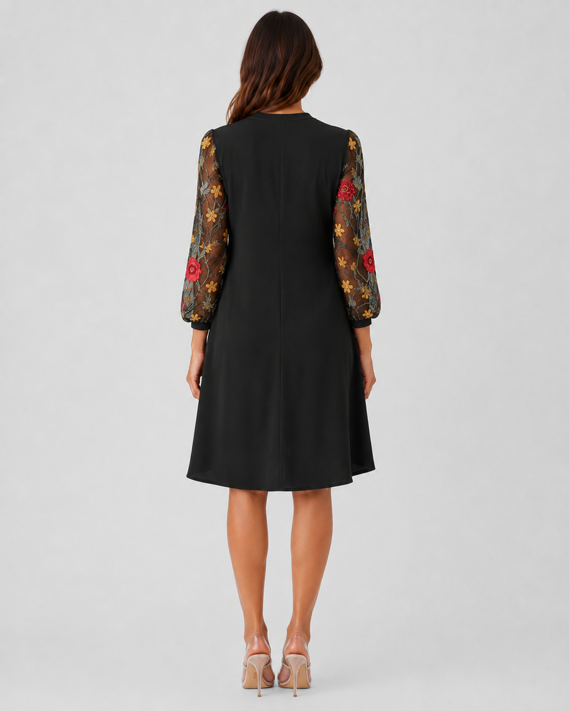 Women's floral mini dress with a V-neckline, sheer long sleeves, lightweight fabric, and a relaxed fit, ideal for casual wear, events, and evening outings.