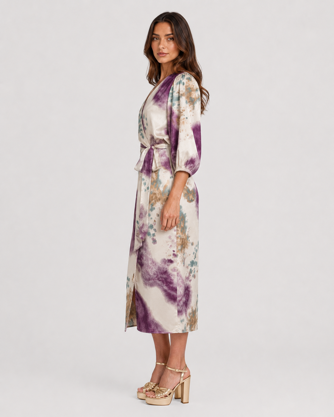 Women’s printed two-piece set by Klyne Studios featuring a V-neck long sleeve slim-fit top and matching relaxed-fit bottoms in a soft cotton and polyester blend.