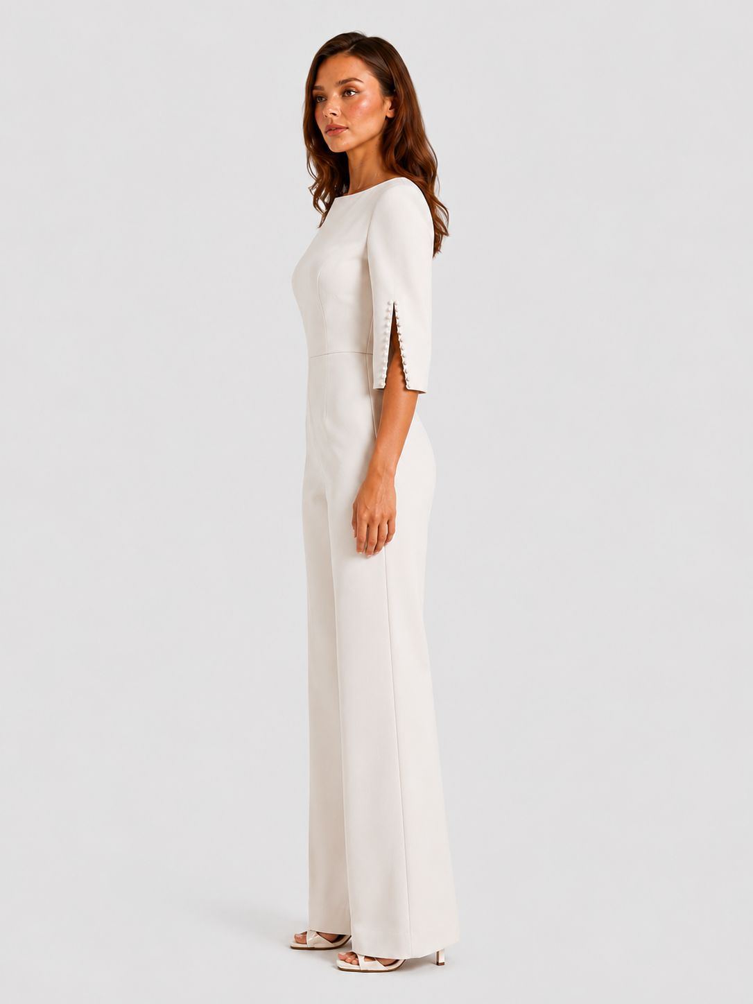 Women’s elegant wide-leg jumpsuit featuring a boat neckline, tailored bodice, three-quarter split sleeves with pearl trim detailing, and flowing wide-leg trousers for weddings, evening events, and special occasions.