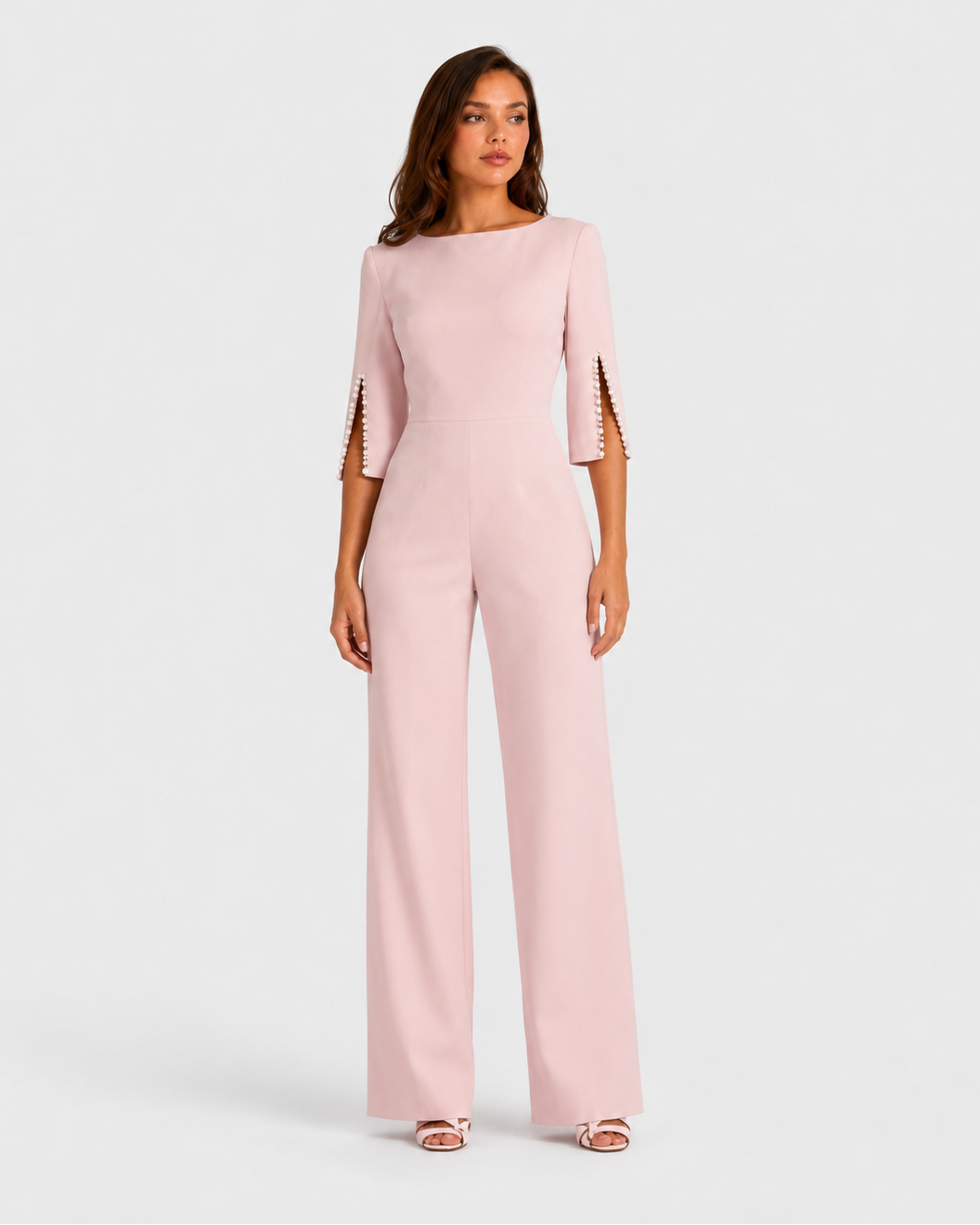 Women’s elegant wide-leg jumpsuit featuring a boat neckline, tailored bodice, three-quarter split sleeves with pearl trim detailing, and flowing wide-leg trousers for weddings, evening events, and special occasions.